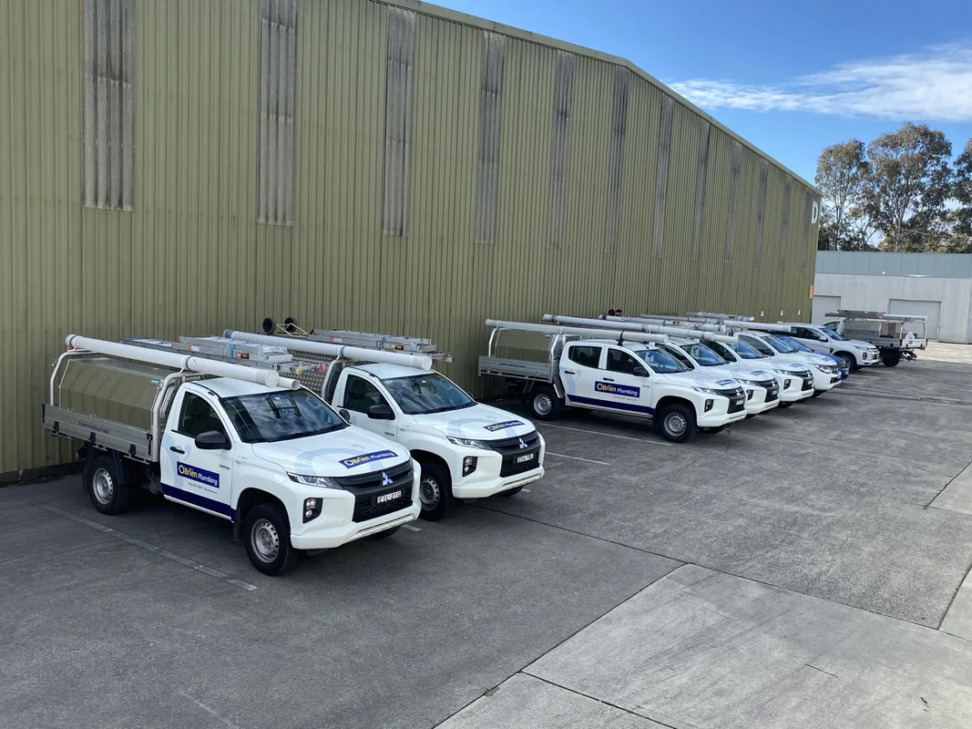 O'Brien Plumbing & Roofing service fleet