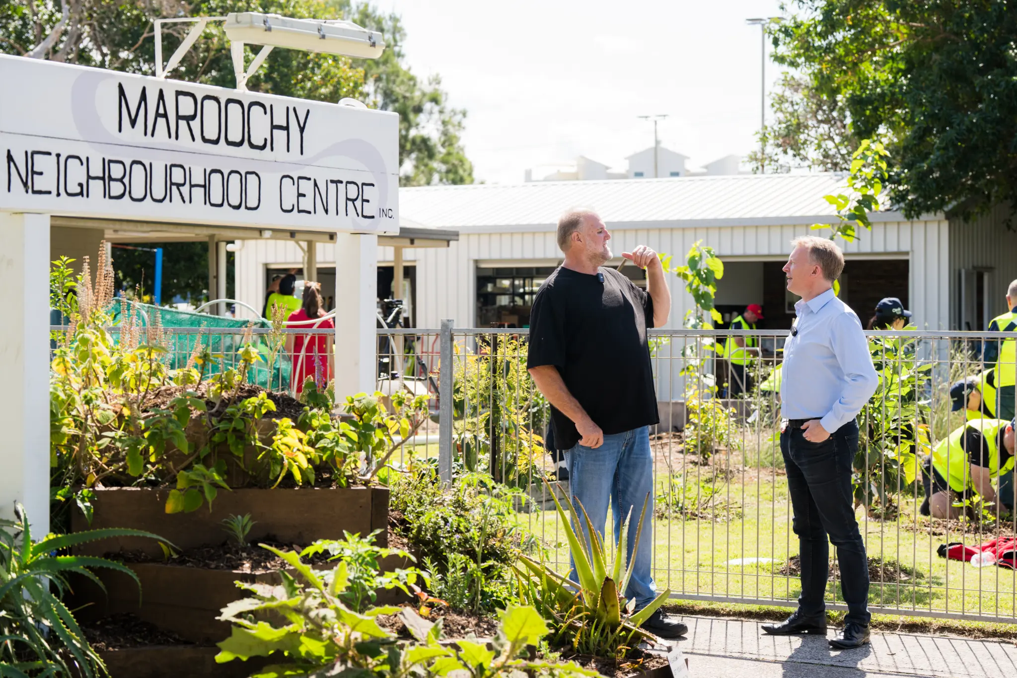 Brad Pesavento at the Maroochy Neighbourhood Centre sign during Taskforce 2025