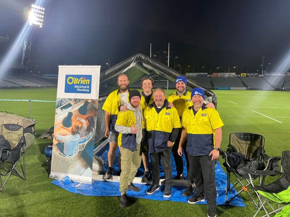 The whole O'Brien Plumbing crew at Central Coast Stadium during the Coast Shelter Sleepout 2022
